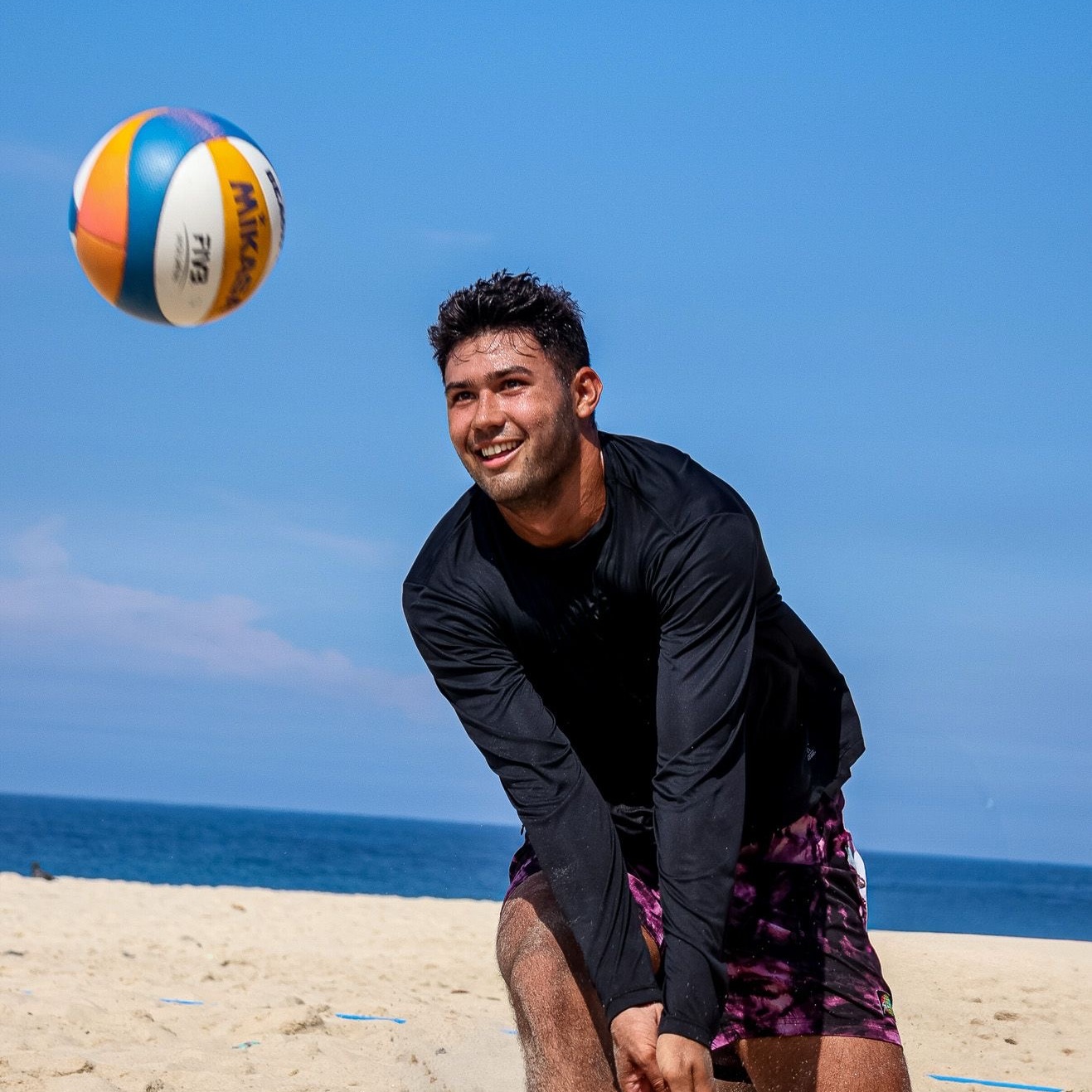 Coach Sami Jindyeh beach volleyball action